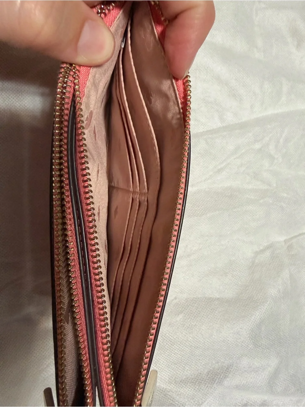 kate spade pink wristlet clutch with strawberry appliqués